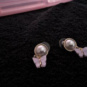 Purple butterflies and pearls in gold tone earrings
